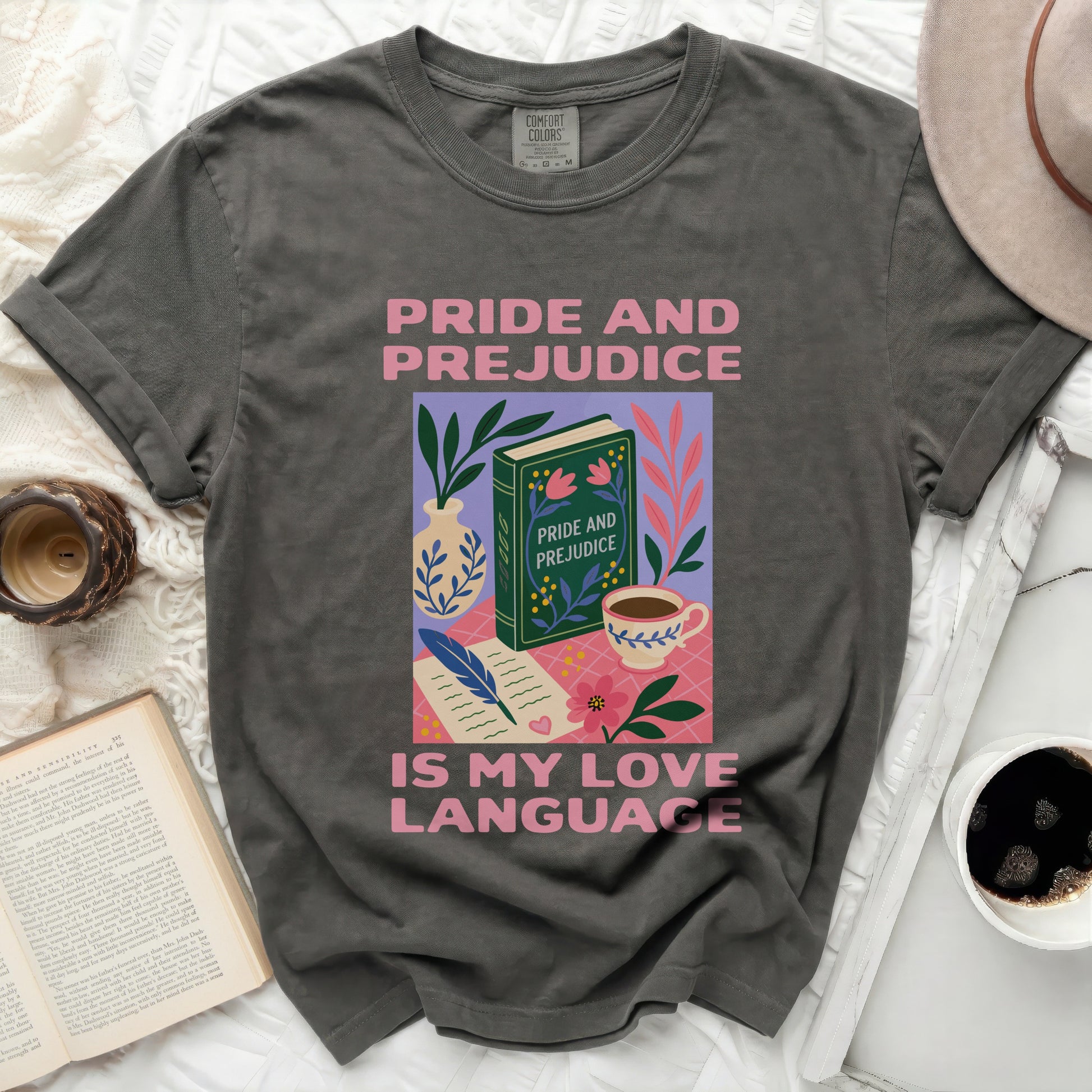 Dark gray t-shirt with "Pride and Prejudice is my love language" text and book illustration.