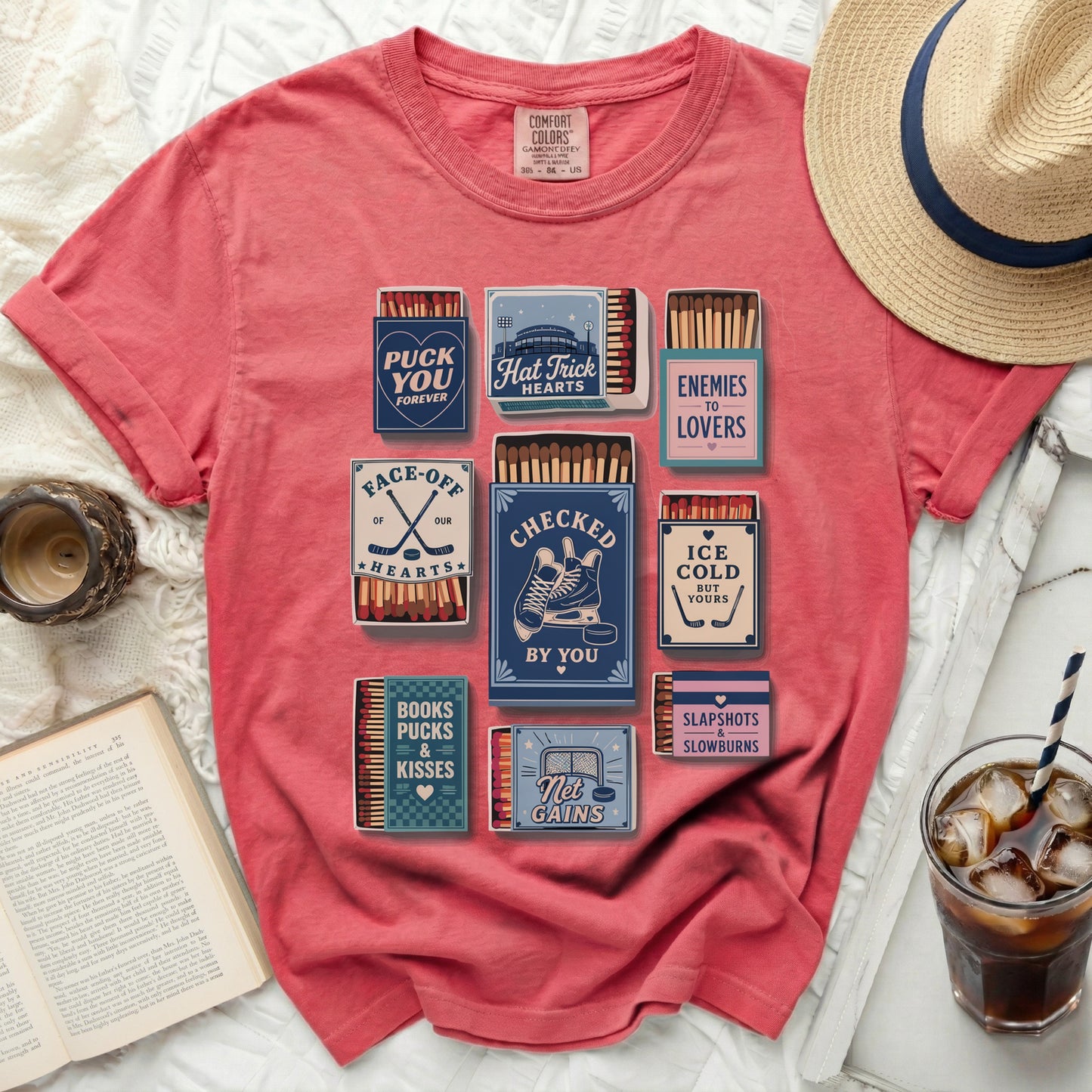 T-shirt with vintage-style matchboxes featuring hockey themes.