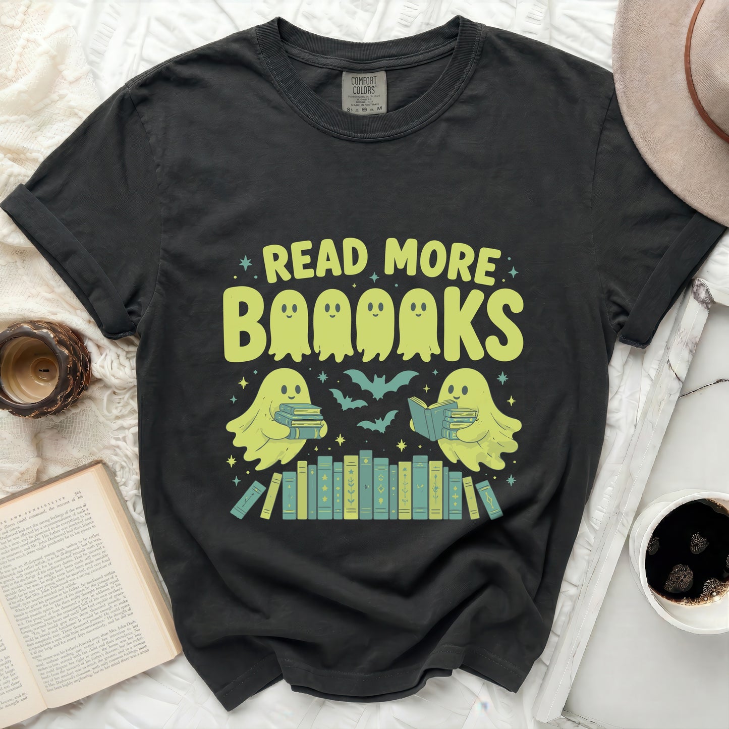 Black t-shirt with ghosts in books and bats, "Read More Booooks" text.