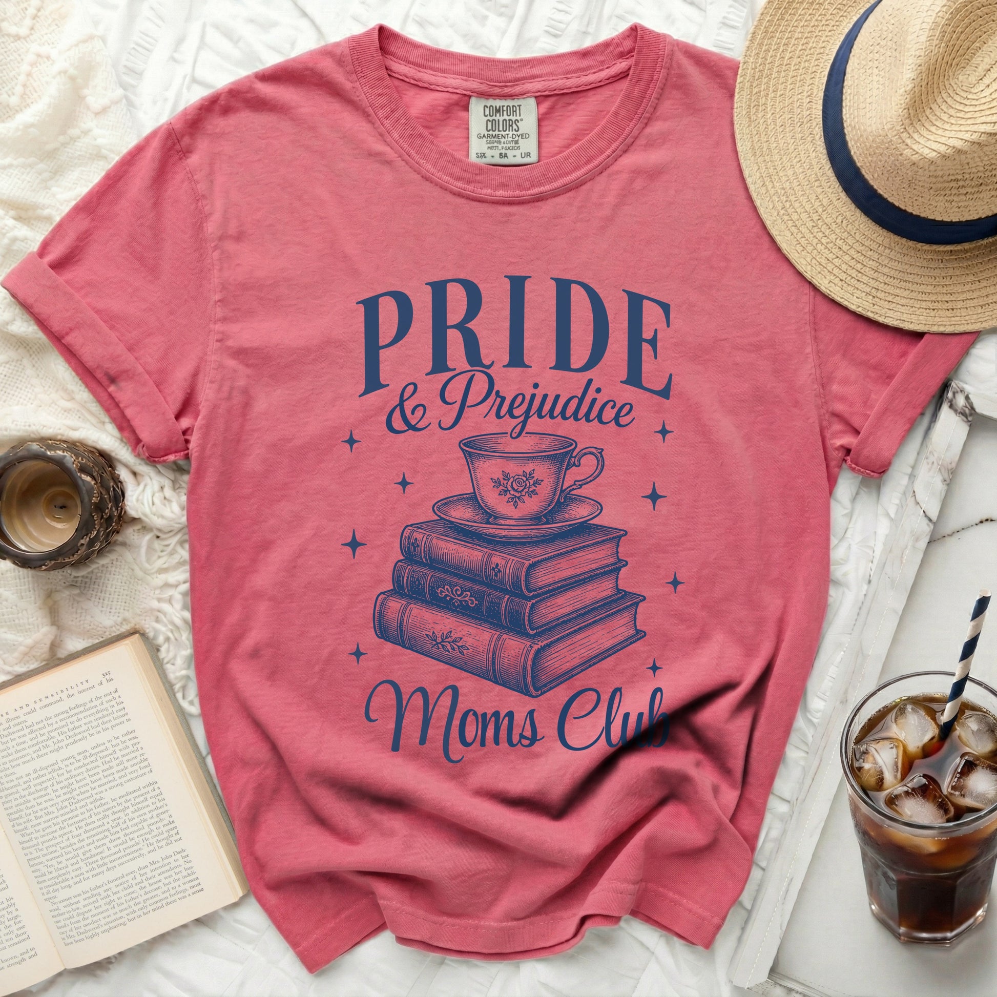 Pink t-shirt with "Pride & Prejudice Moms Club" and teacup graphic