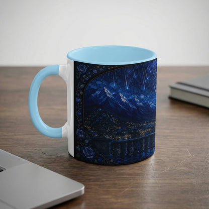 Mug with a celestial stained-glass design of mountains, city lights, and shooting stars.