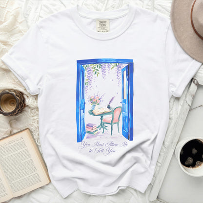 White t-shirt with blue doorway, wisteria, and writing desk graphic.