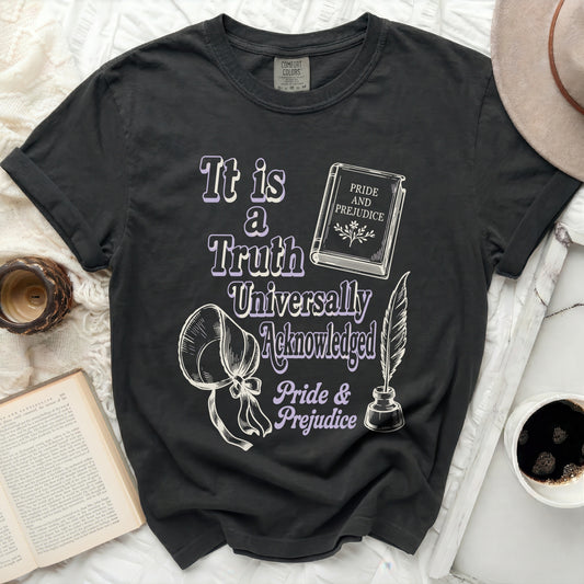 Black t-shirt with "It is a Truth Universally Acknowledged" and "Pride & Prejudice" text.