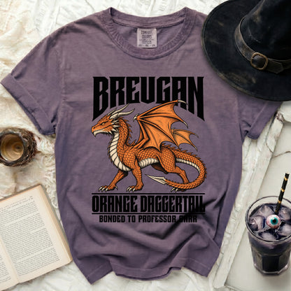 Purple t-shirt with orange dragon graphic and text "BREUGAN", "ORANGE DAGGERTAIL", "BONDED TO PROFESSOR BARR".
