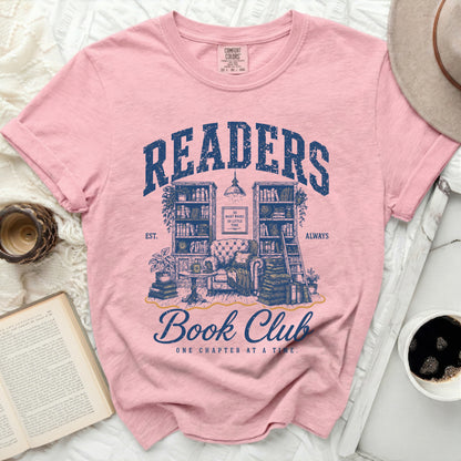 Pink t-shirt with "Readers Book Club" in distressed blue text.