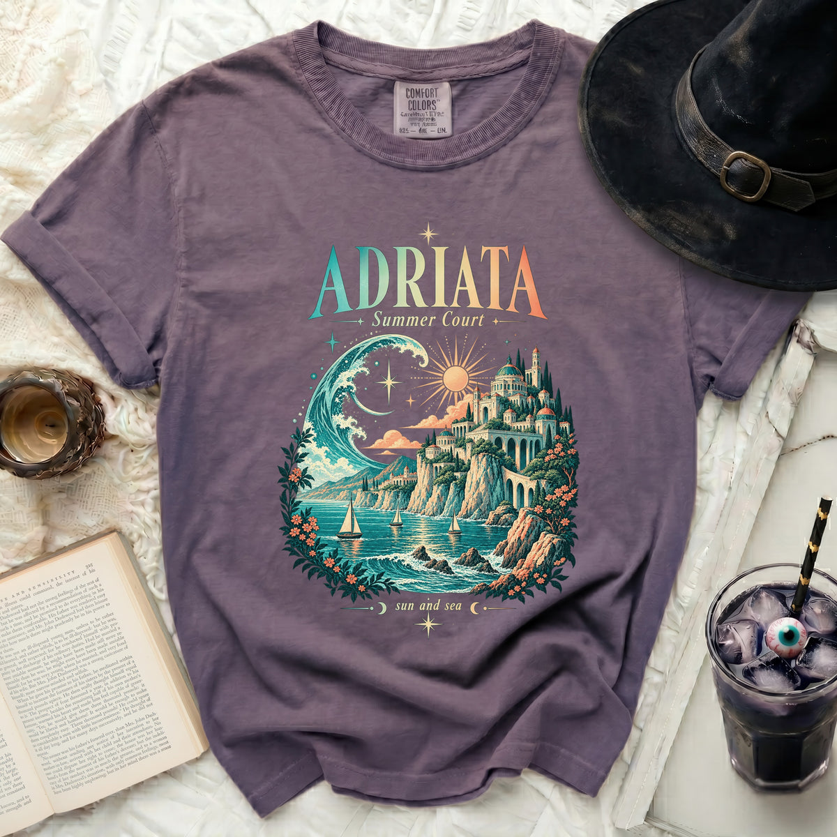 Purple t-shirt with "Adriata Summer Court" and a coastal scene graphic.