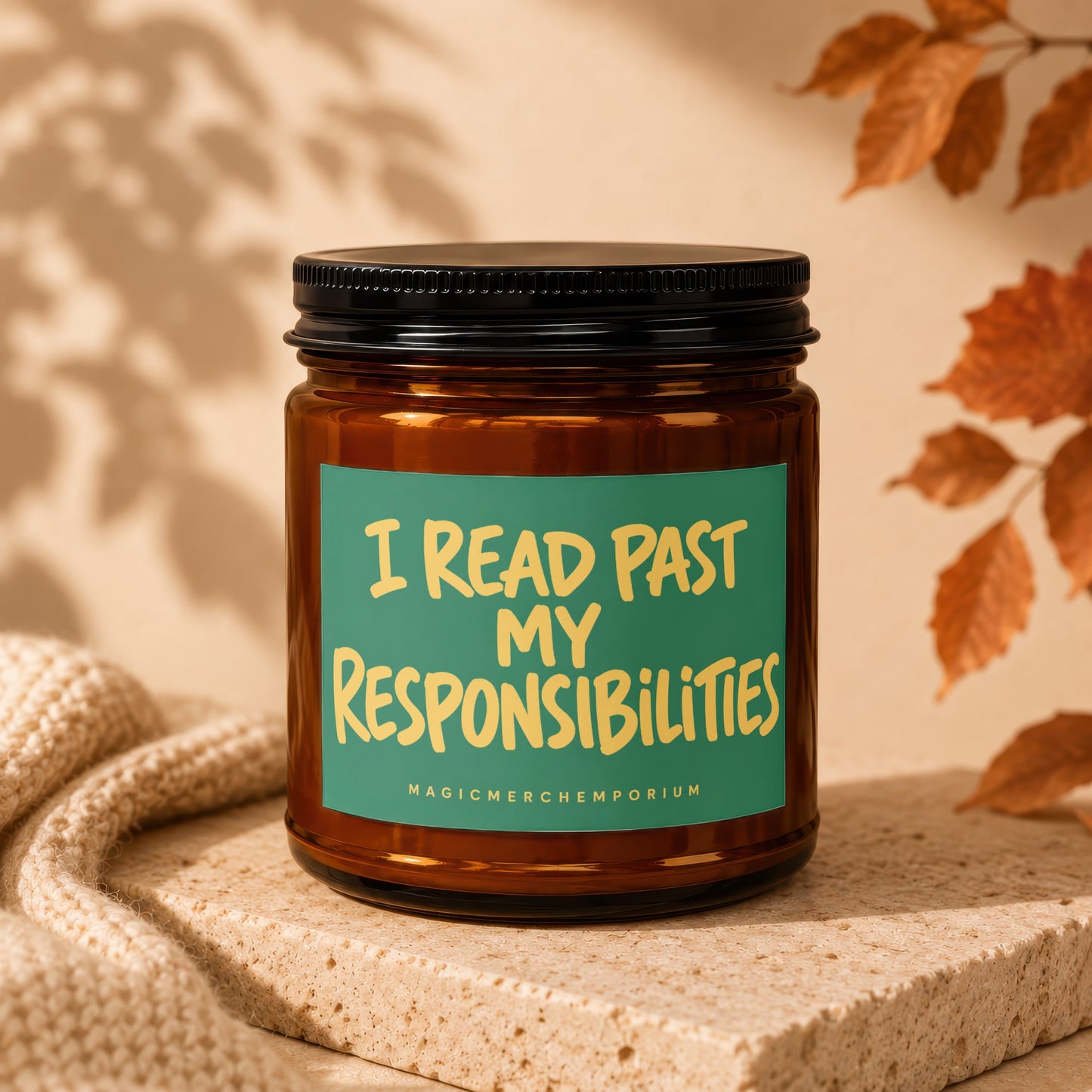 Amber jar candle with a green label that reads "I READ PAST MY RESPONSIBILITIES."