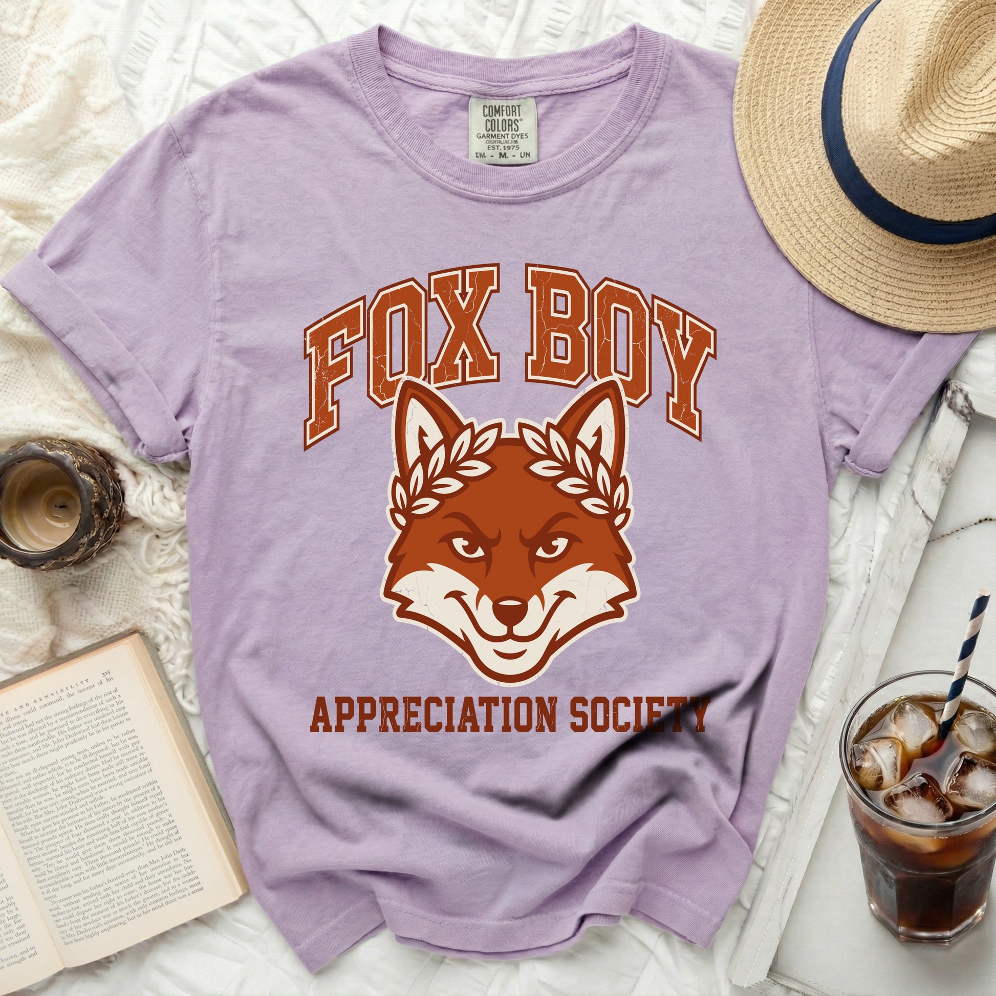 Purple t-shirt with "Fox Boy Appreciation Society" graphic.