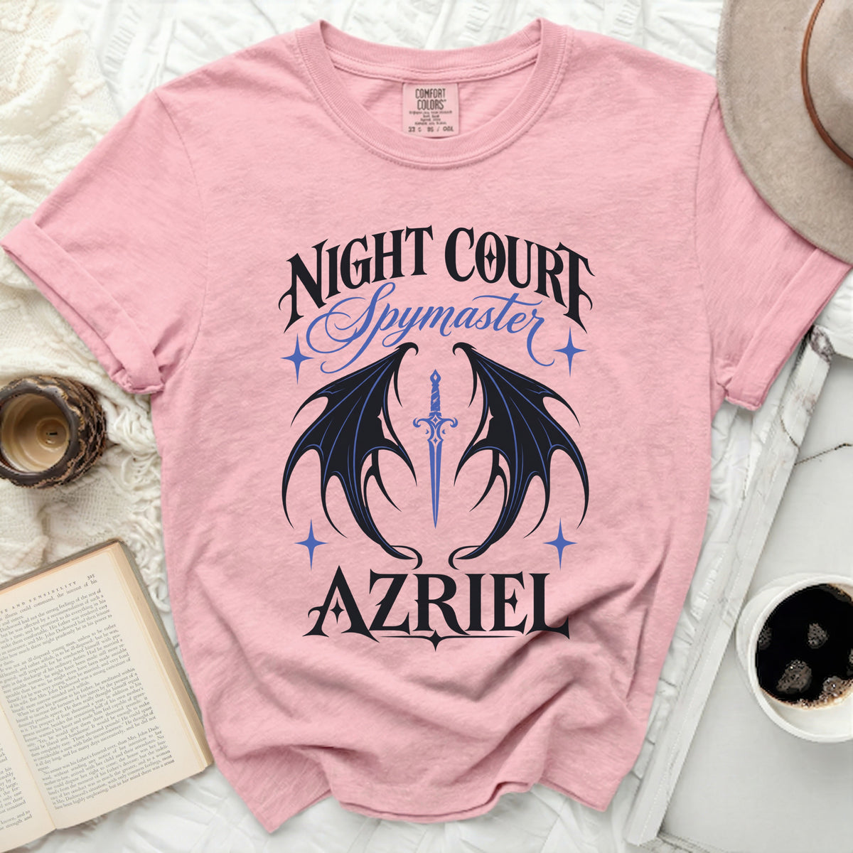 Pink t-shirt with "Night Court Spymaster Azriel" text and wings.