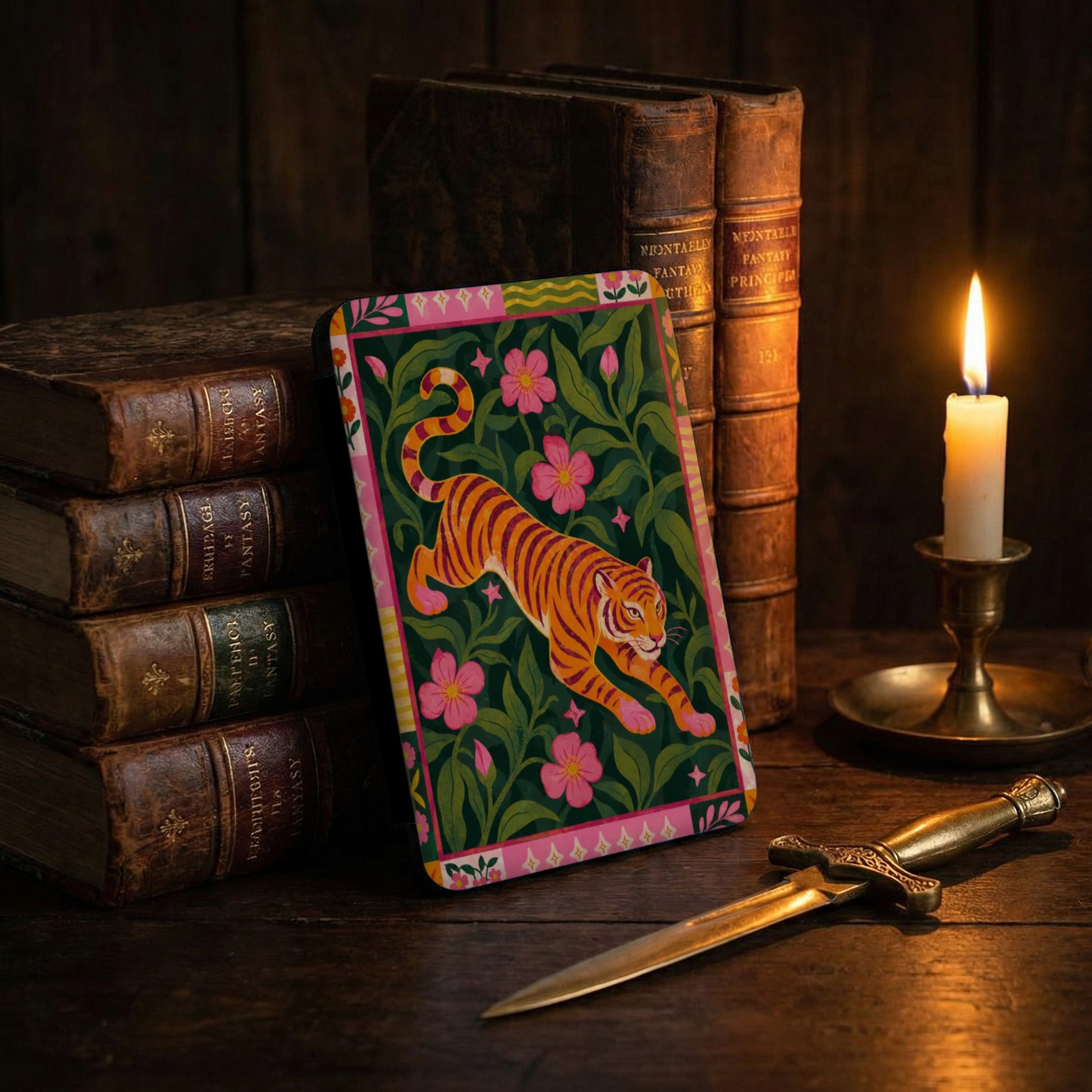 Tiger on floral pattern with antique books under candlelight.