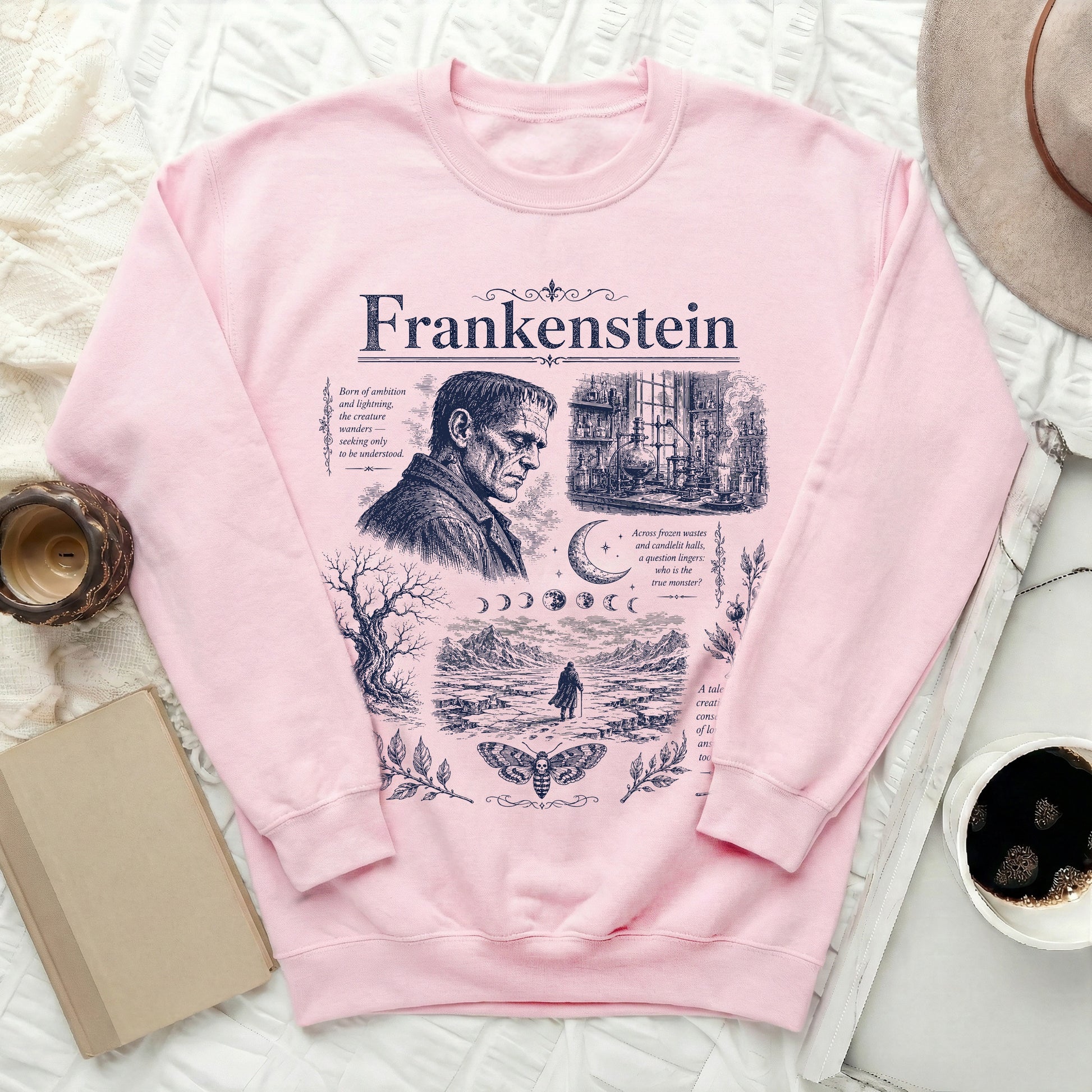 Pink sweatshirt with Frankenstein's creature, laboratory, and text.