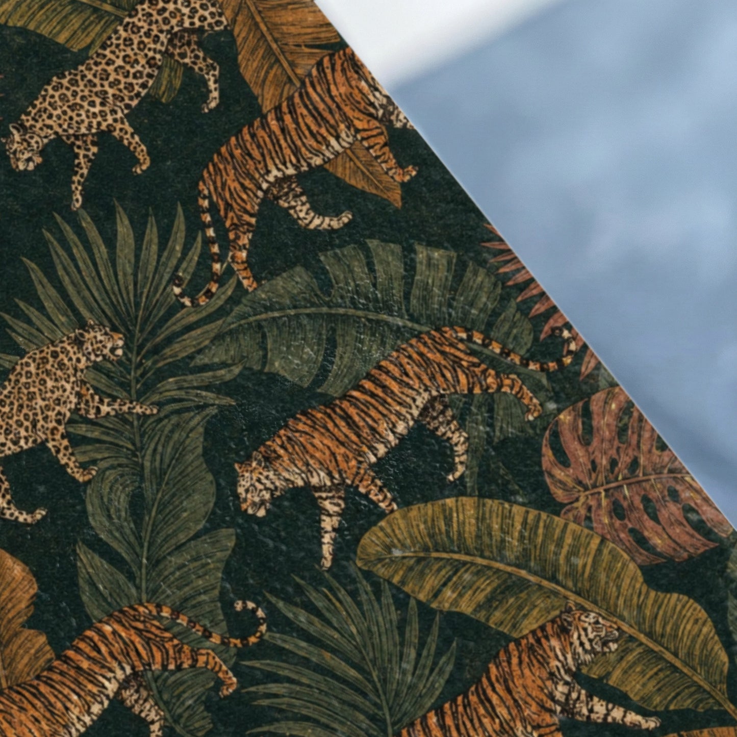 Pattern of tigers and leopards among tropical leaves on a dark background.