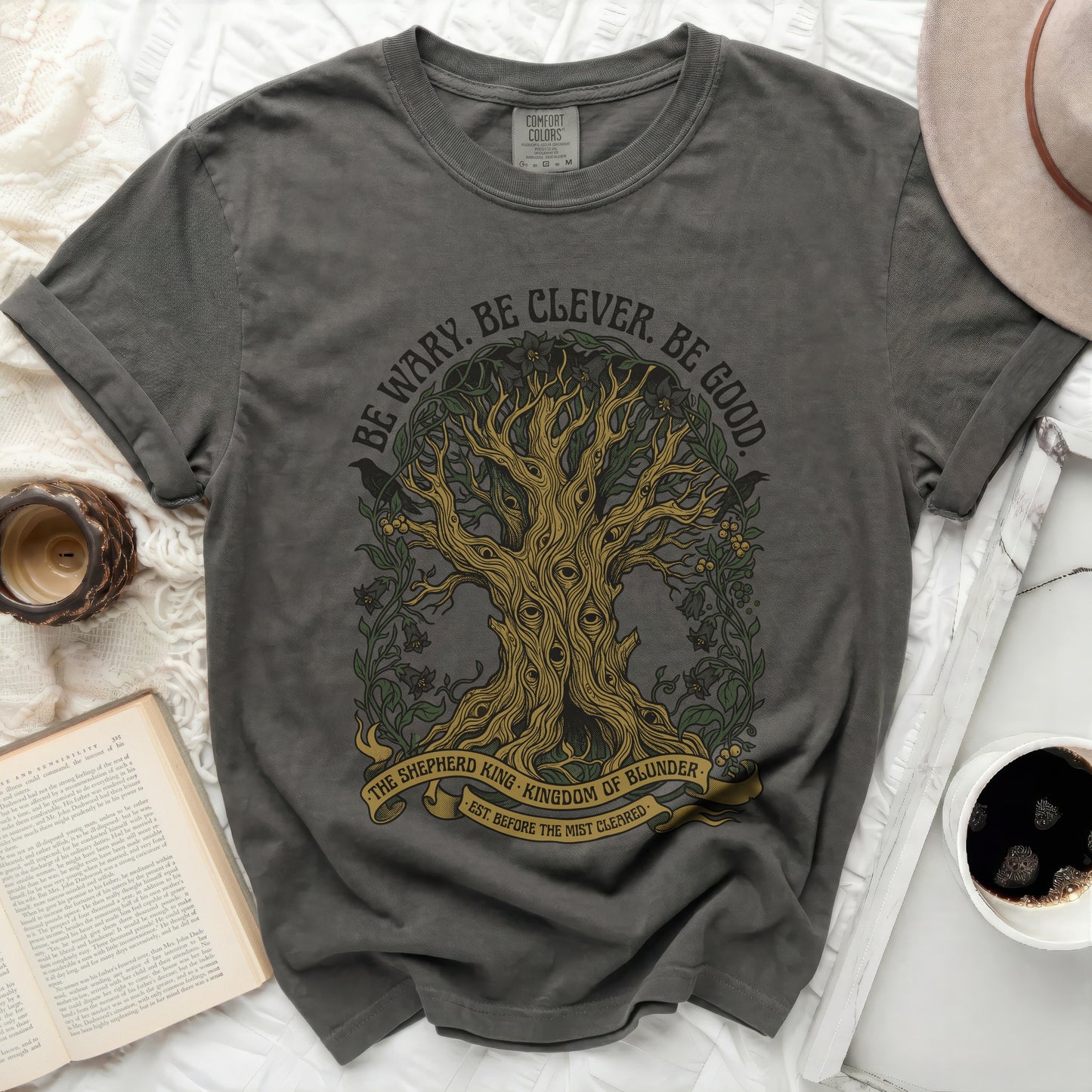 Dark grey t-shirt with a tree graphic and text "Be Wary. Be Clever. Be Good."