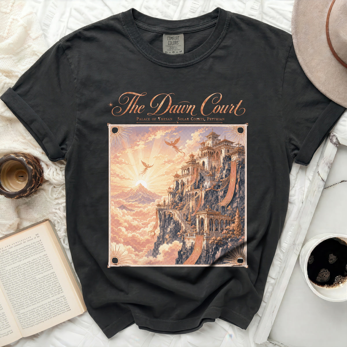Dark t-shirt with "The Dawn Court" and fantasy palace illustration.