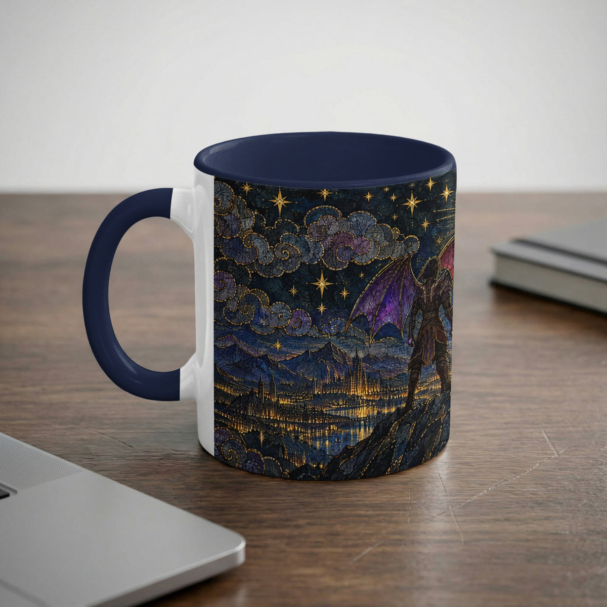 A ceramic coffee mug with a blue handle and interior, featuring a fantasy landscape illustration.