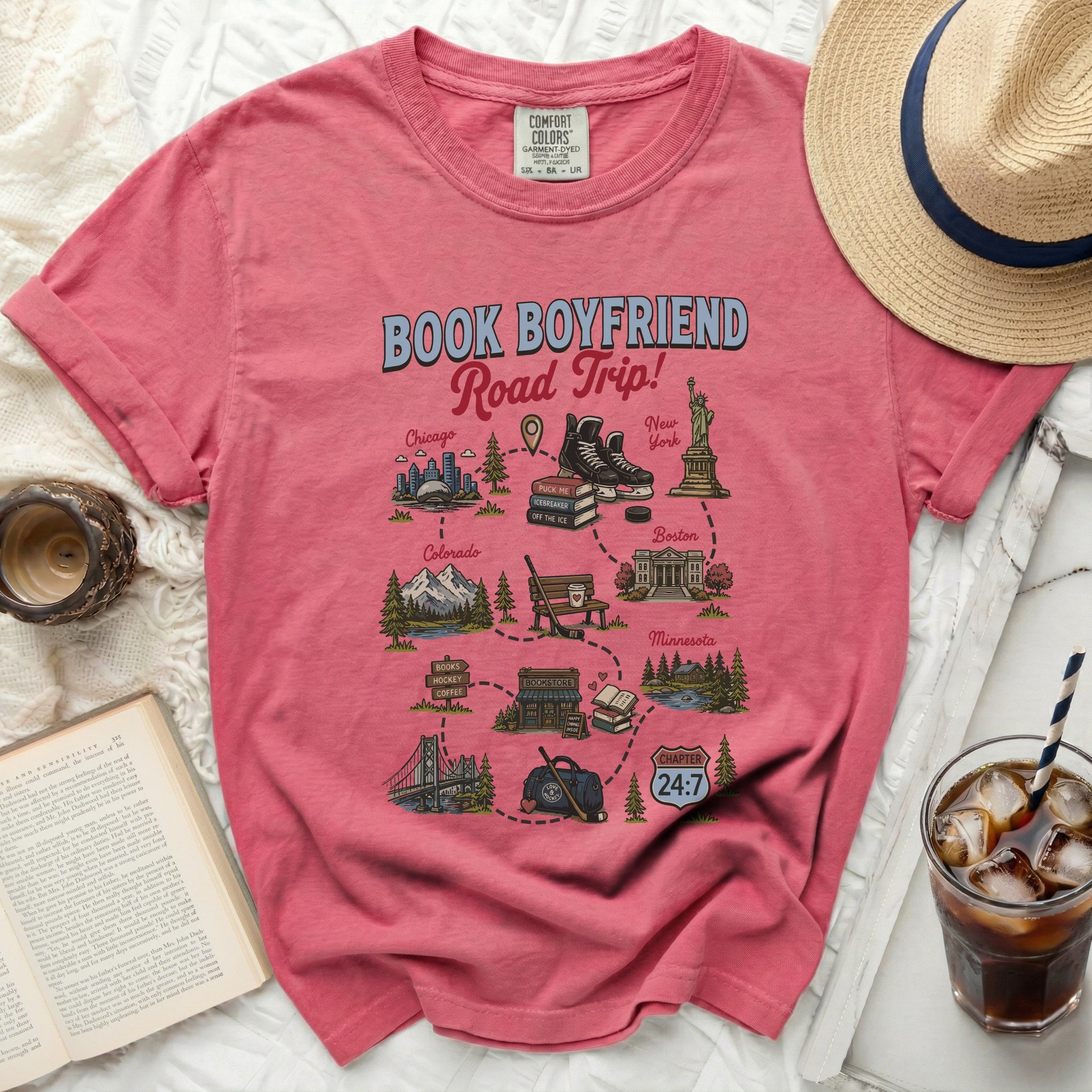 Comfort Colors t-shirt with "Book Boyfriend Road Trip" design and city icons.
