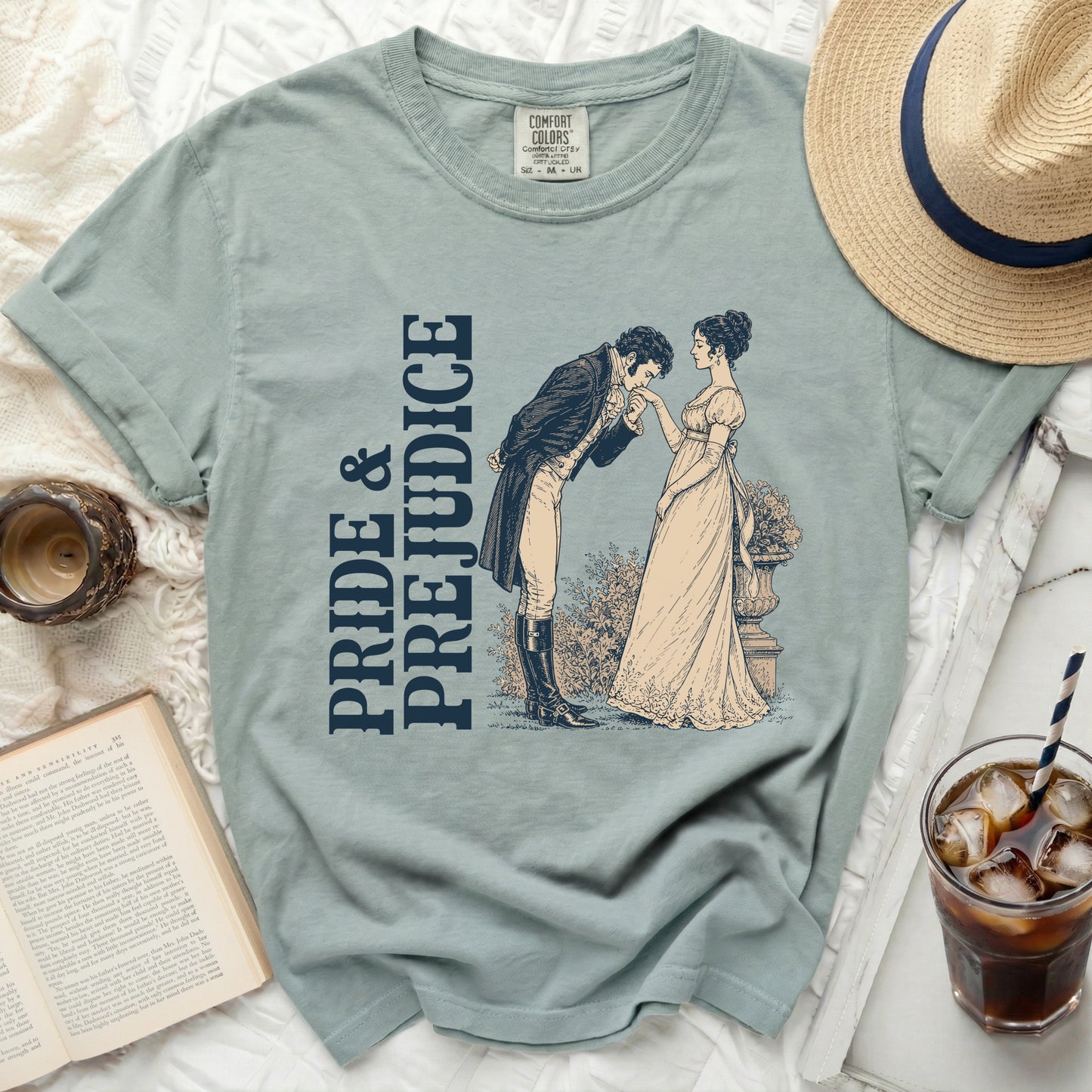 Pride & Prejudice t-shirt with illustration of a couple, and Comfort Colors tag.