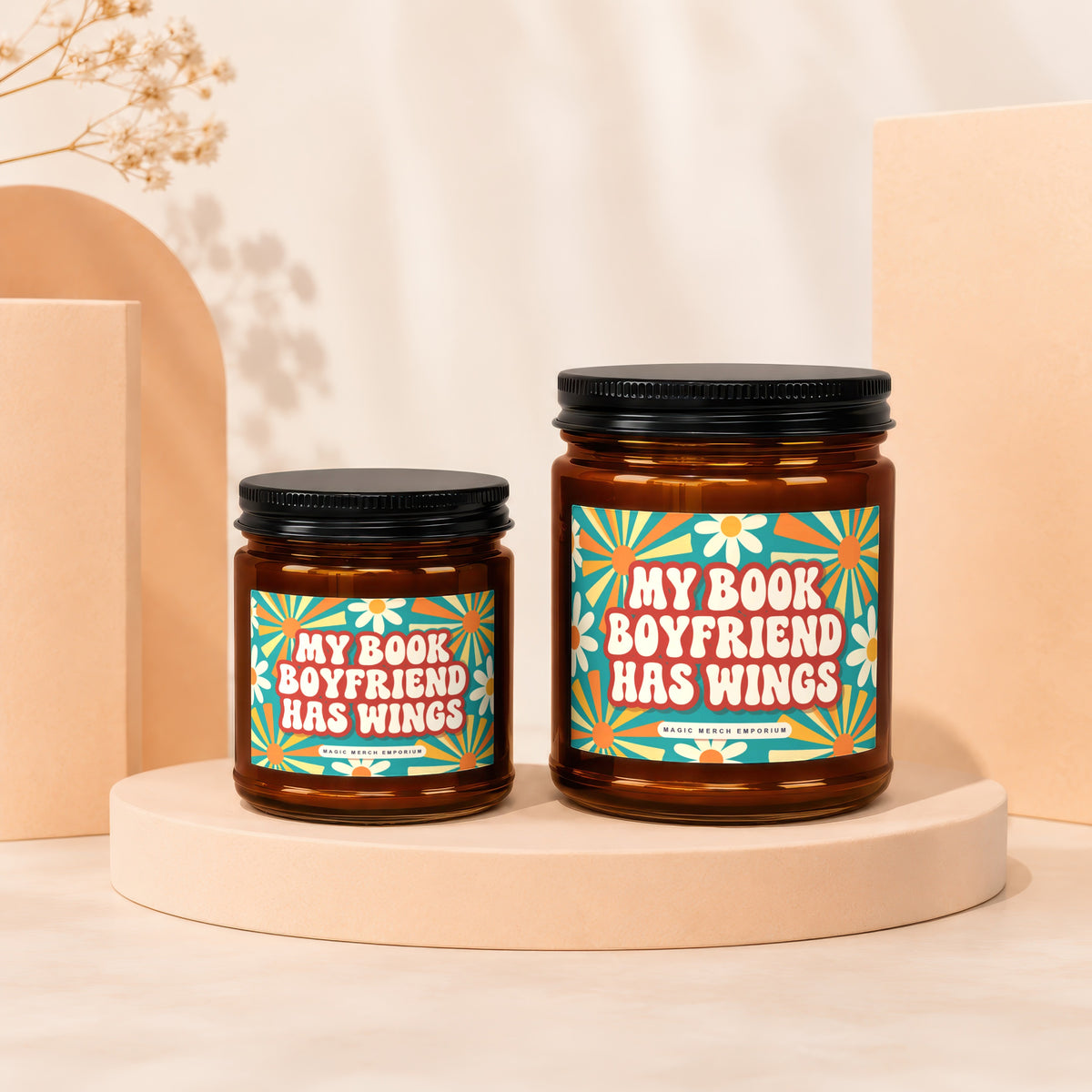 Two candles with "My Book Boyfriend Has Wings" text and floral designs.