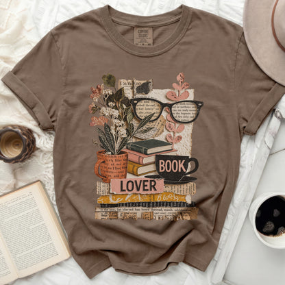 Brown t-shirt with "LOVER BOOK" graphic of books, plants, and glasses.