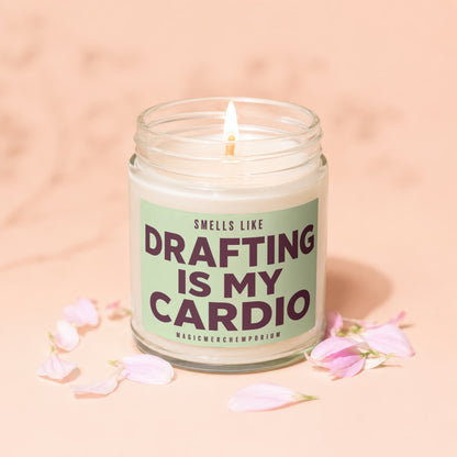 Jar candle with lit flame and "Drafting Is My Cardio" text.