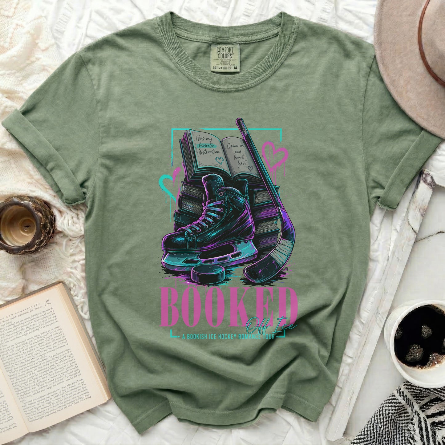 Booked Off, an ice hockey romance bookish t-shirt with skates and stick.