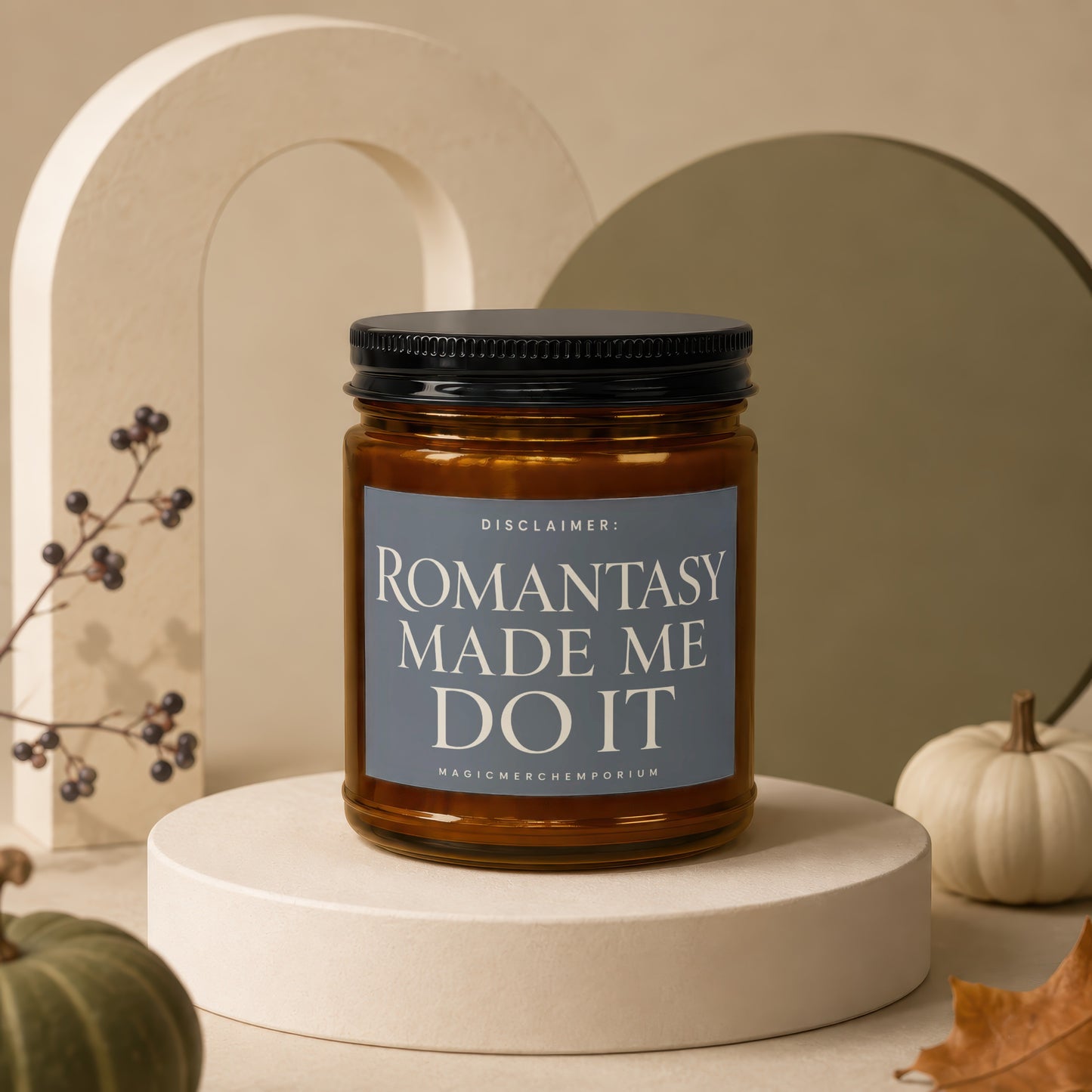 Brown glass candle with black lid, reading "ROMANTASY MADE ME DO IT".
