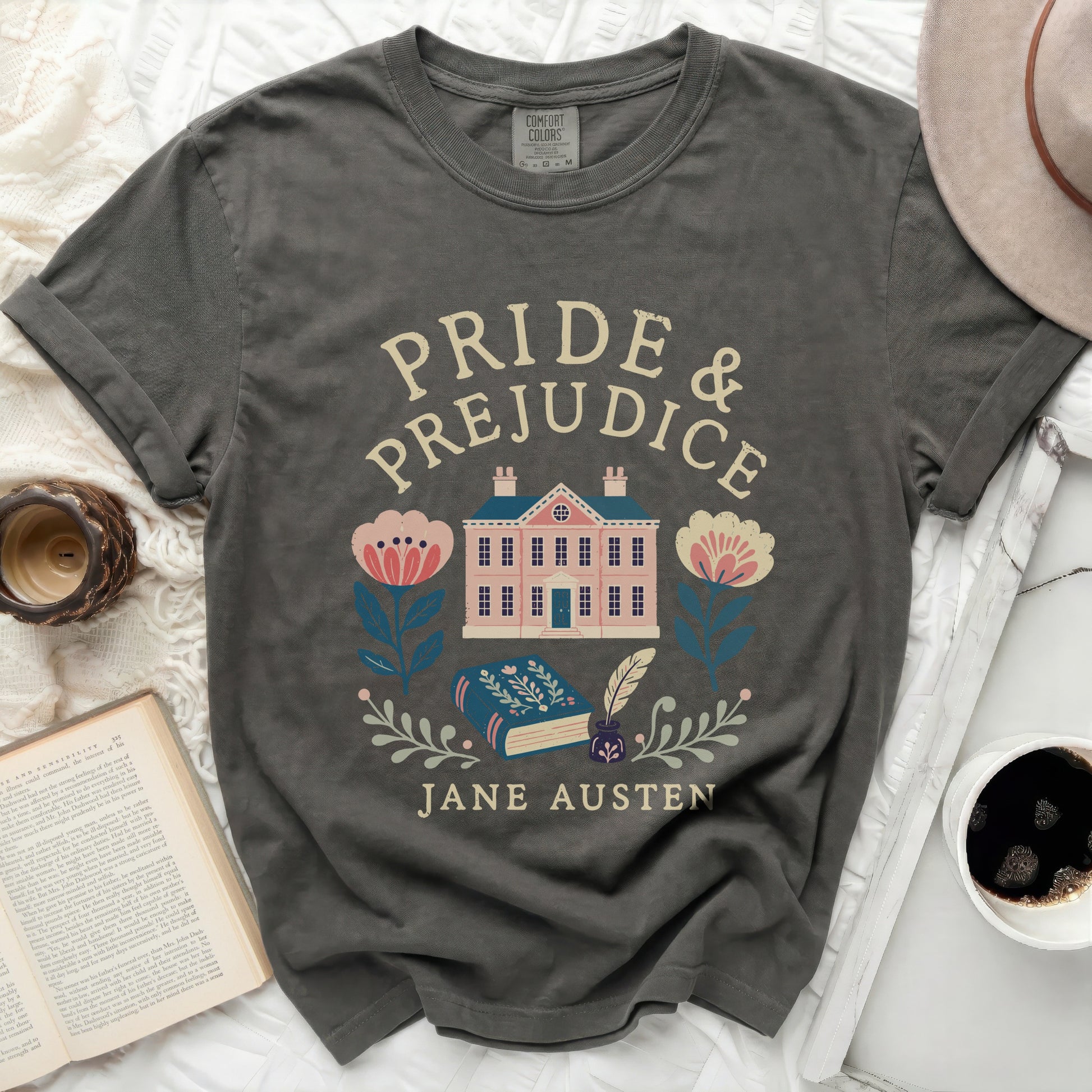 Pride & Prejudice Jane Austen t-shirt with house and book design.