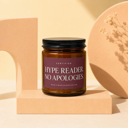 Amber jar candle with "HYPE READER. NO APOLOGIES." text on label.