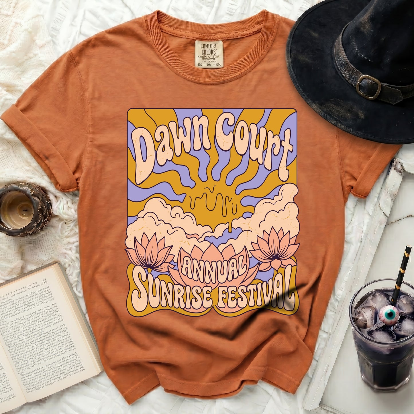 Orange t-shirt with "Dawn Court Annual Sunrise Festival" graphic.