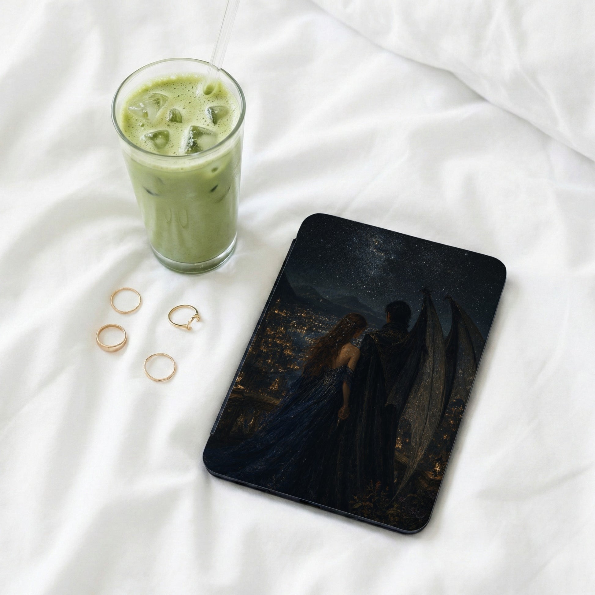 Ipad case with fantasy art, a couple overlooking a starry city landscape.