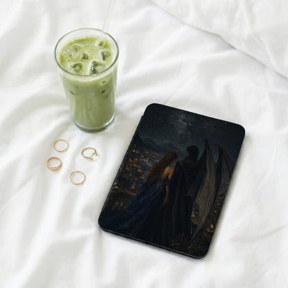 Ipad case with fantasy art, a couple overlooking a starry city landscape.