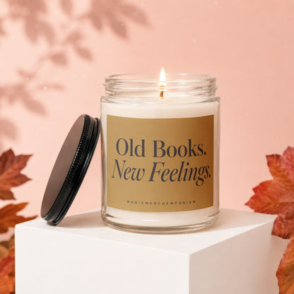 Scented candle with "Old Books. New Feelings." text on the label.