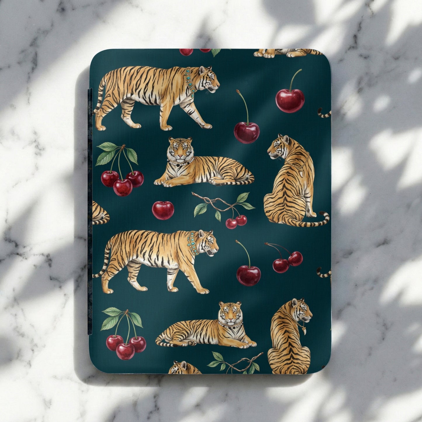 Tiger and cherry pattern on a dark teal background.