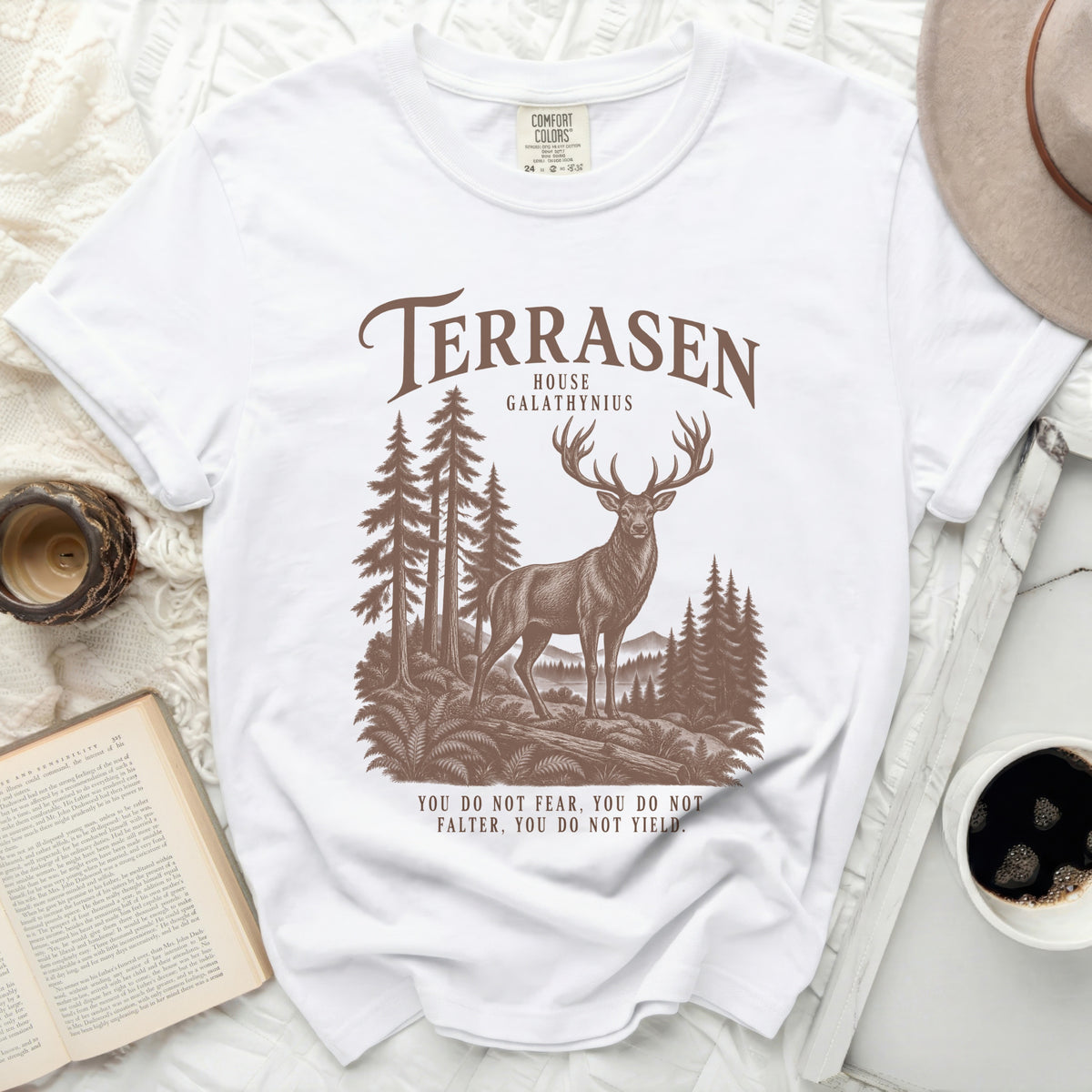 White t-shirt with Terrasen House Galathynius deer and trees design and quote.