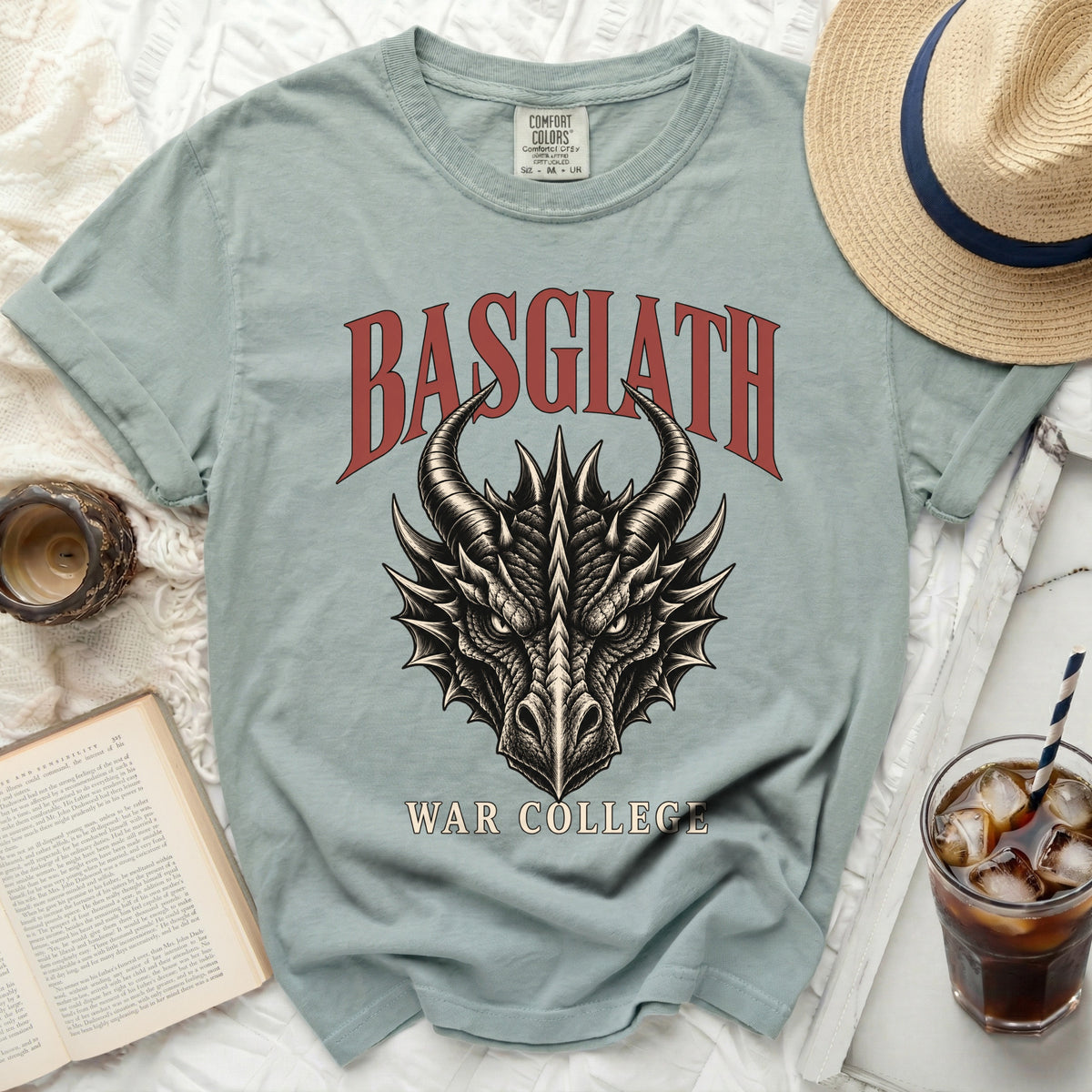 Light blue t-shirt with "BASGIATH WAR COLLEGE" text and a dragon head graphic.