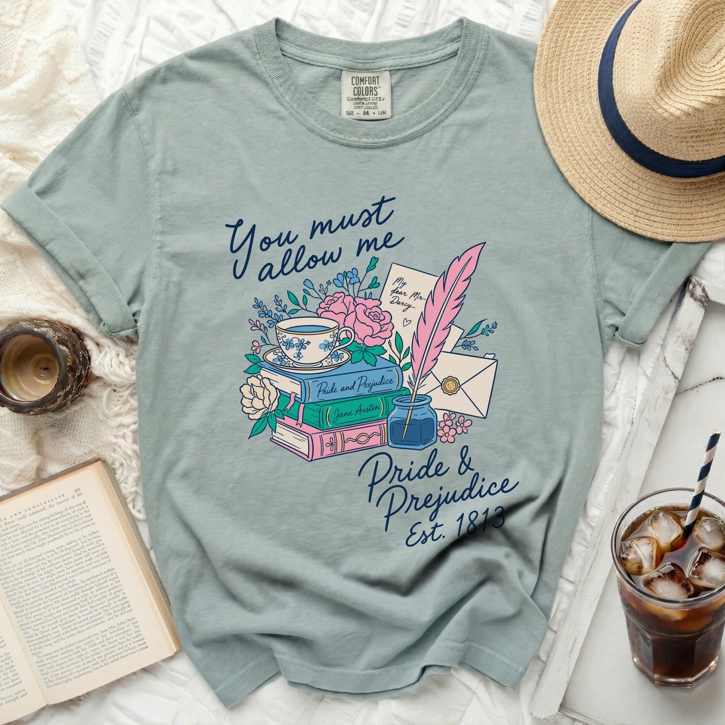 Light blue t-shirt with Pride and Prejudice quote and illustration.