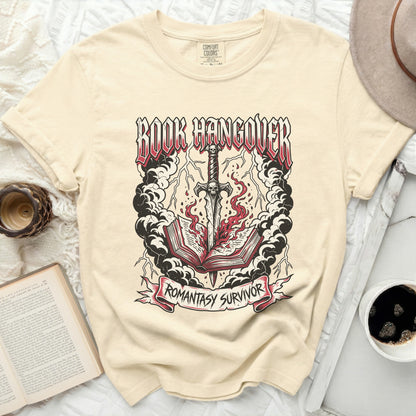Cream t-shirt with "Book Hangover" and "Romantasy Survivor" graphic.