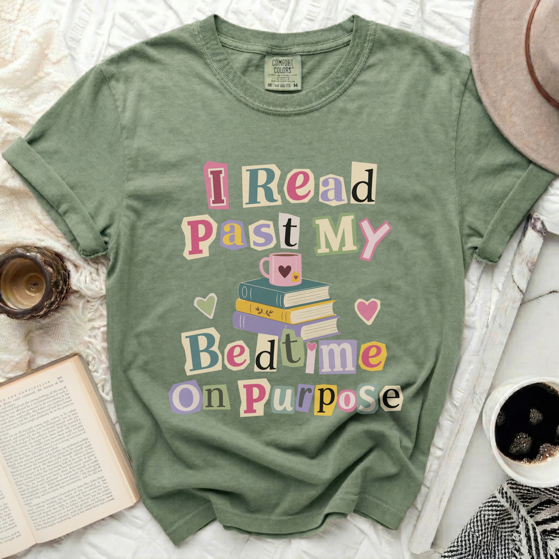Green t-shirt with "I Read Past My Bedtime On Purpose" text.
