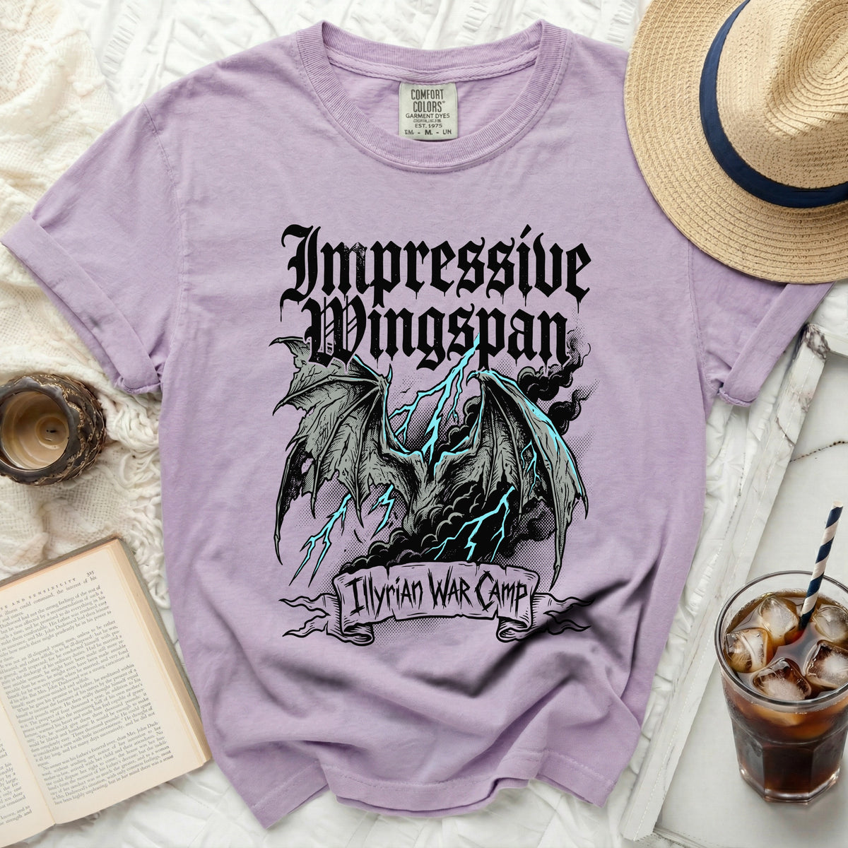 Purple t-shirt with black dragon graphic and text "Impressive Wingspan Illyrian WAR Camp".