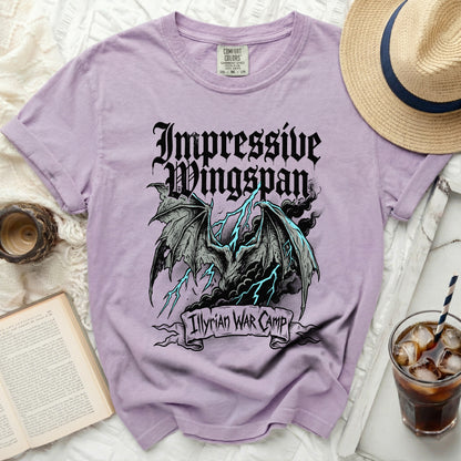 Purple t-shirt with black dragon graphic and text "Impressive Wingspan Illyrian WAR Camp".