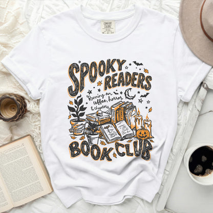 White t-shirt with "Spooky Readers Book Club" Halloween graphic.
