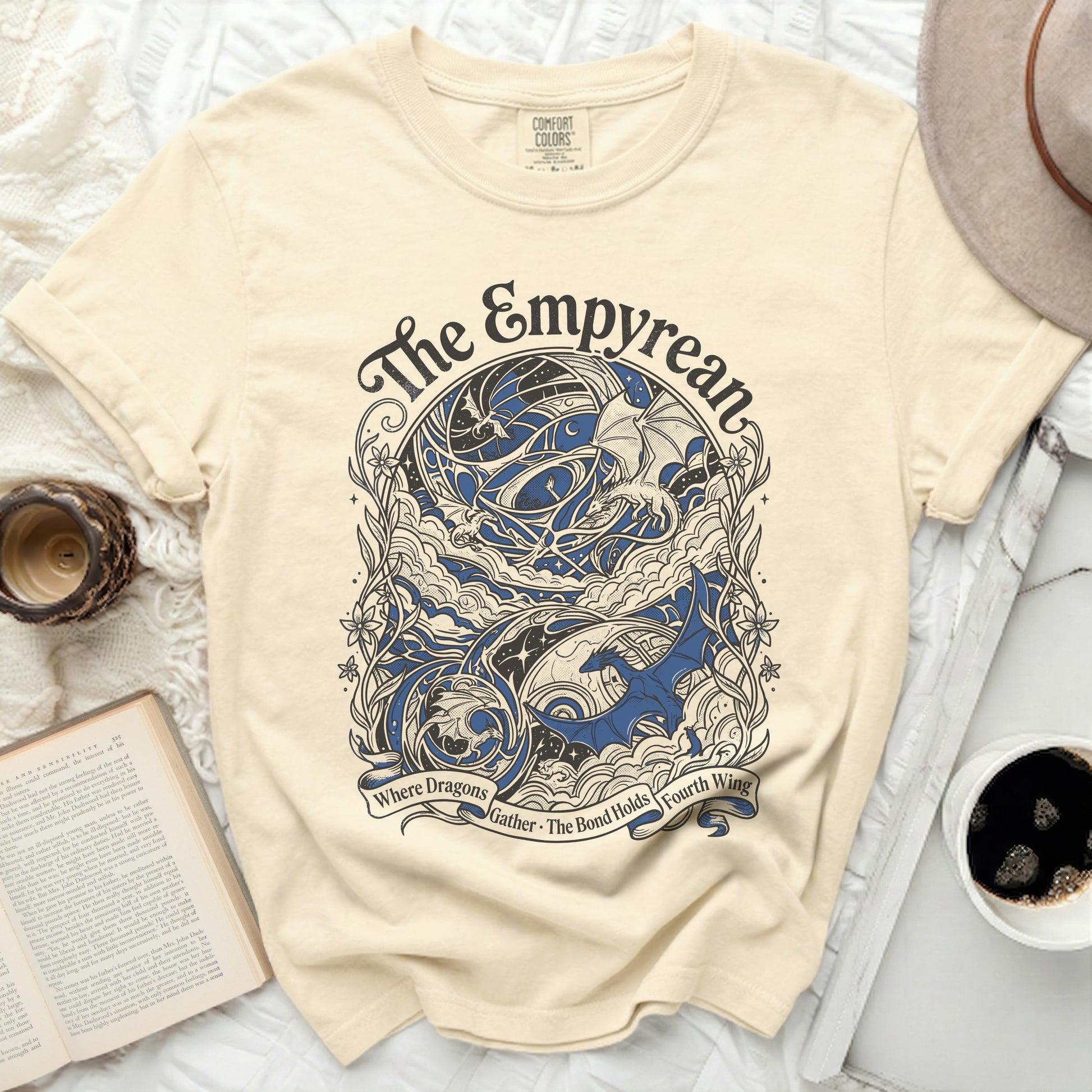 Cream t-shirt with "The Empyrean" text and dragon graphic.