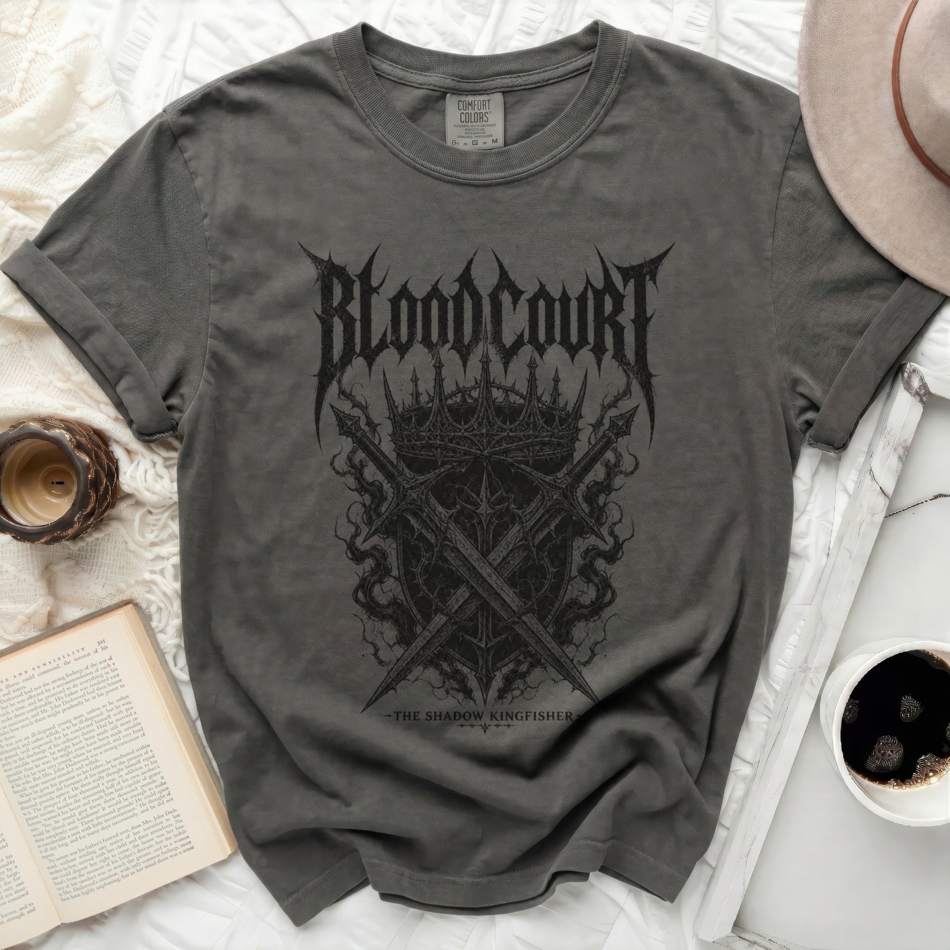 Dark grey t-shirt with "Blood Court The Shadow Kingfisher" graphic.