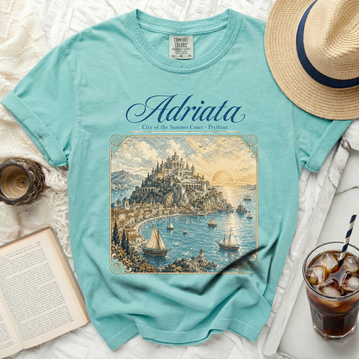 Teal t-shirt with "Adriata City of the Summer Court Prythian" graphic.