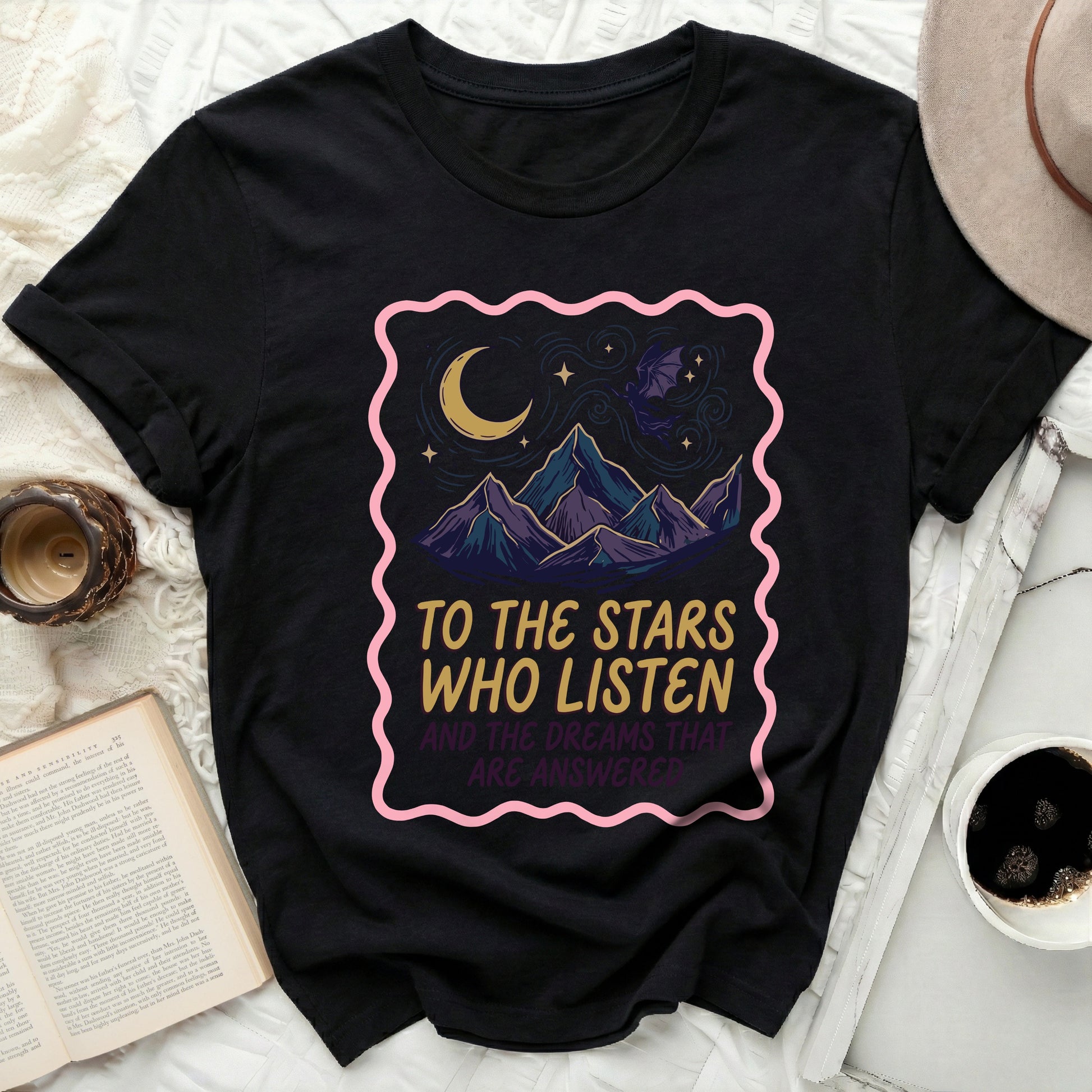 TO THE STARS WHO LISTEN black shirt product type
Black T-Shirt
Mountain Design
Moon Stars Graphic
Bat Creature Art
Quote Shirt
To The Stars Who Listen
Dreams Answered
Night Sky Theme
Fantasy Inspired
Celestial Apparel
Aesthetic Tee
Unique Graphic
Inspirational Quote
Bookish Gift
Dark Academia Style
Mystical Design
Stellar Motif
Indie Clothing
Graphic Top
Adventure Shirt