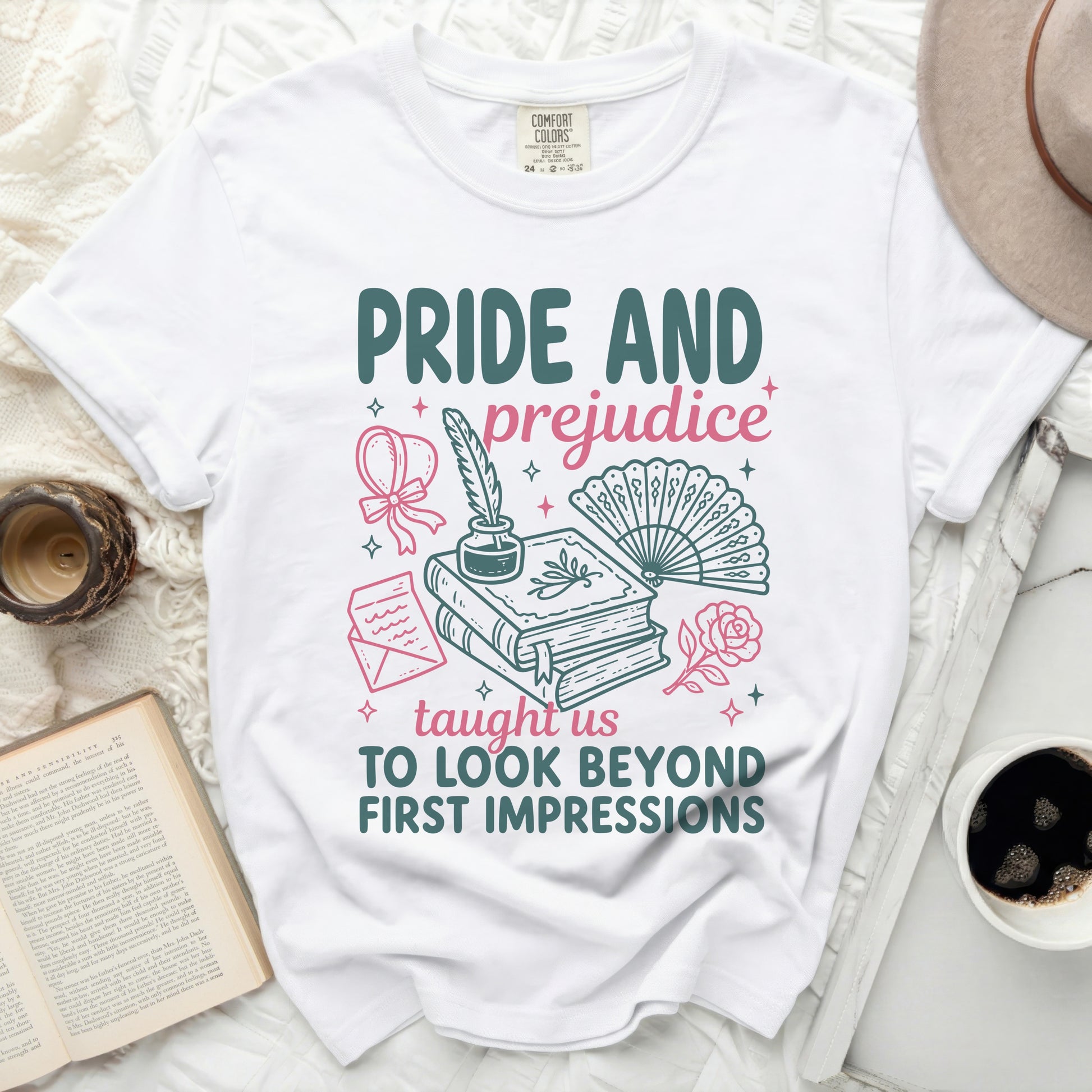 White Comfort Colors t-shirt with "Pride and Prejudice" graphic and quote "Taught us to look beyond first impressions."