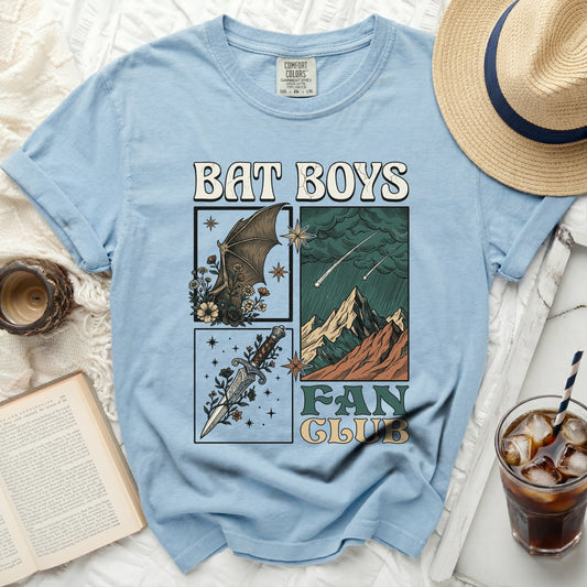 Light blue t-shirt with "Bat Boys Fan Club" text and graphic art.