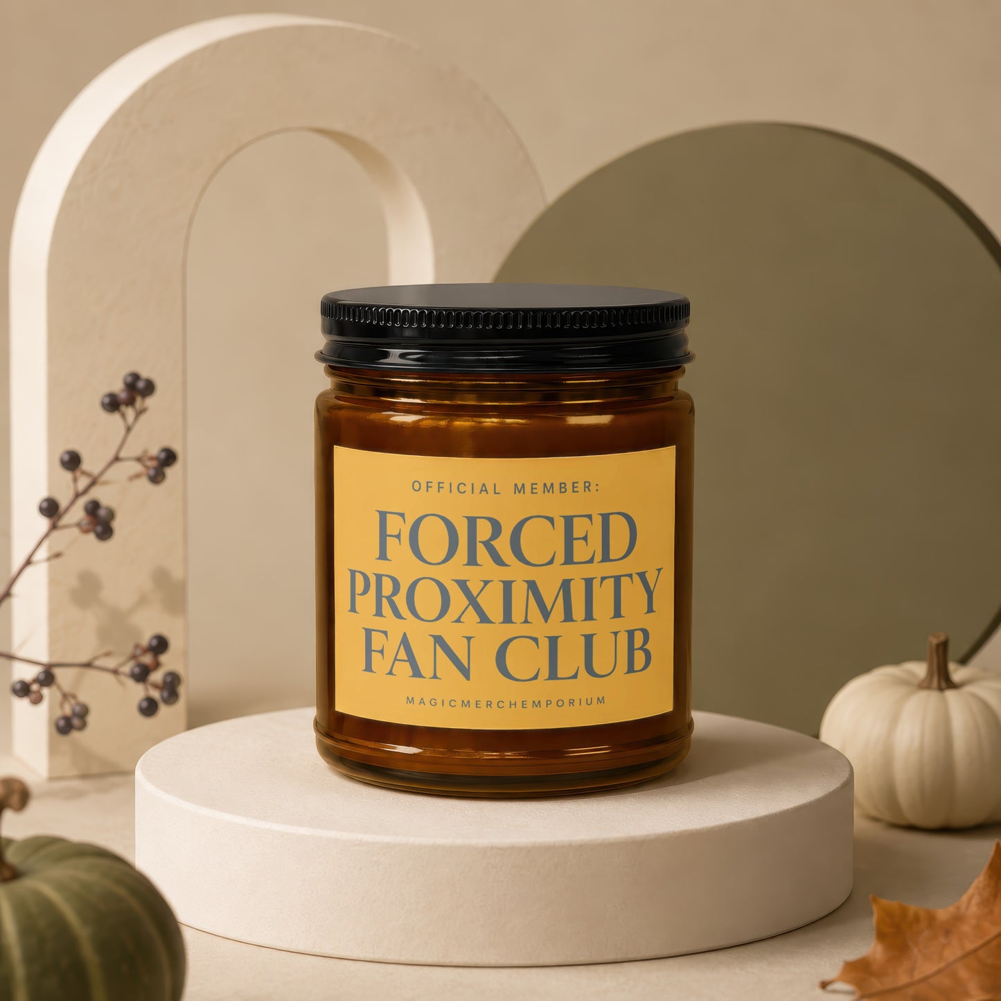 Glass jar candle with label: "OFFICIAL MEMBER: FORCED PROXIMITY FAN CLUB".