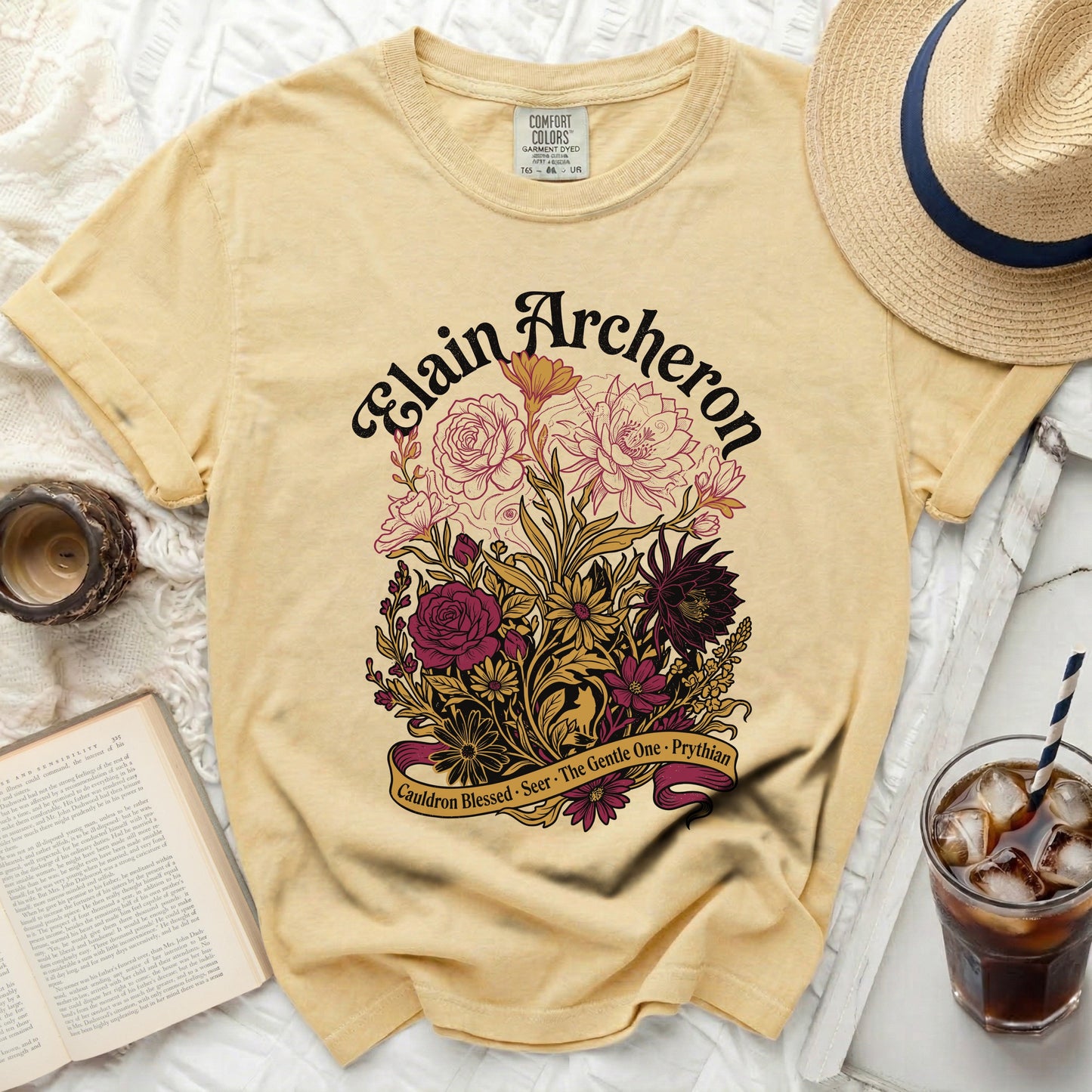 Yellow t-shirt with "Elain Archeron" and floral design.