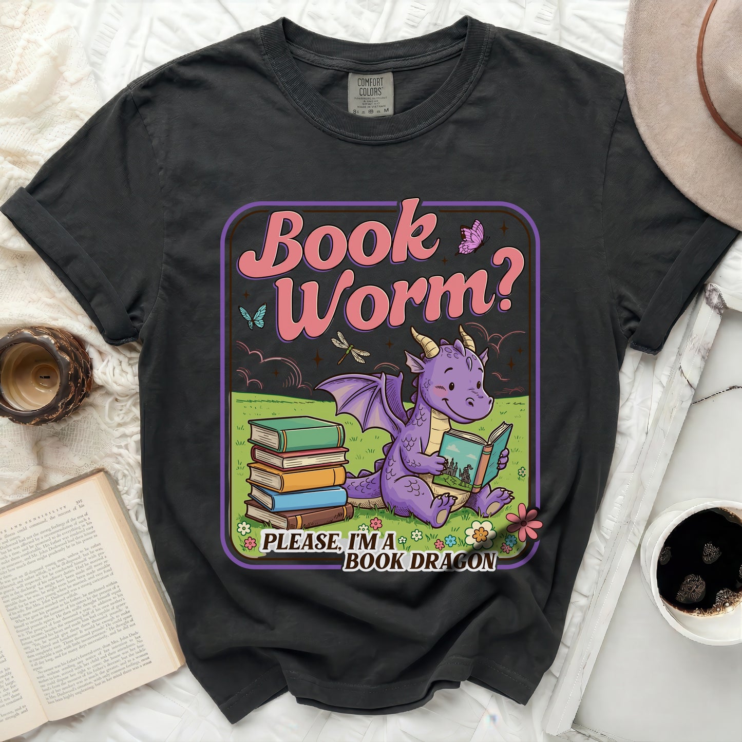 Black t-shirt with purple dragon reading a book and "Book Worm? Please, I'm a Book Dragon."
